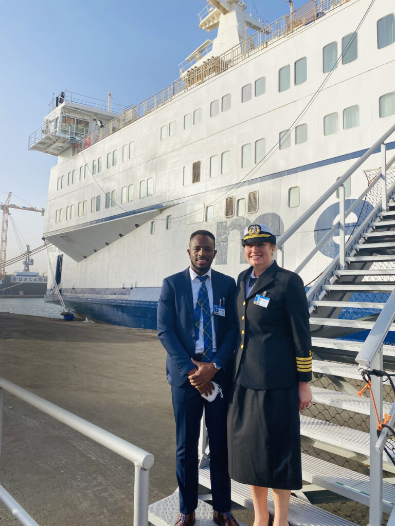 Hagerty and onboard accountant Moise Njiphuep from Cameroon arrive in Senegal.