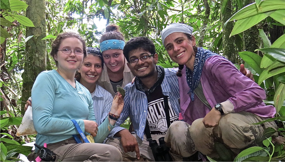 Kasun Bodawatta (center) with Wendy Tori (right) and other students during a summer research trip in the Amazon Rainforest